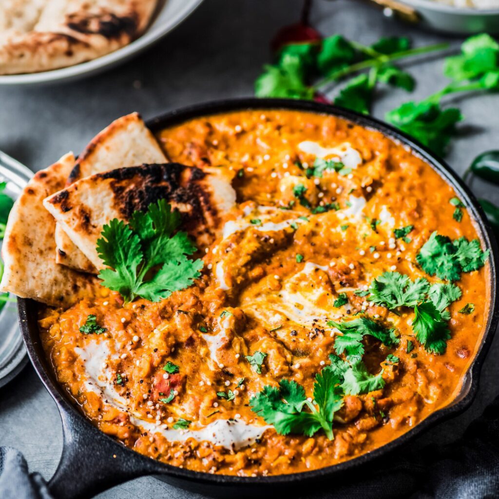 Vegan Red Lentil Curry in a cast iron pan