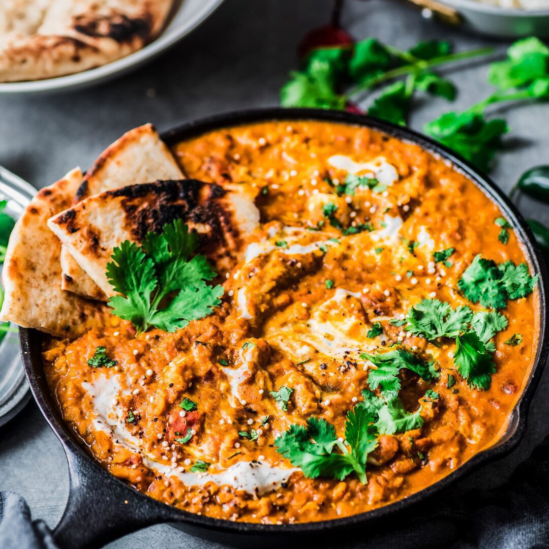 Vegan Red Lentil Curry in a cast iron pan